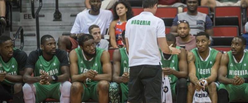 Nigeria basketball team and coach